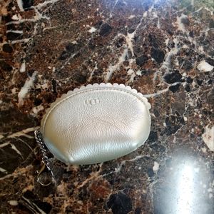 Small, gray and silver UGG wallet bag/clutch.